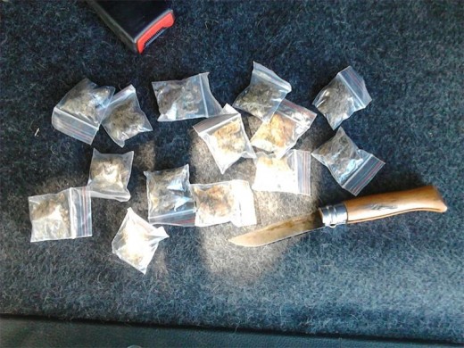 Illegal contraband and a weapon are found by police officers.